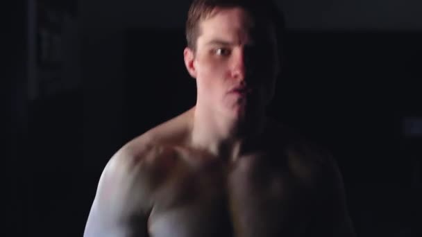 Strong Determined Male Athlete Bounces His Toes Anticipation Dark Portrait — Stock Video