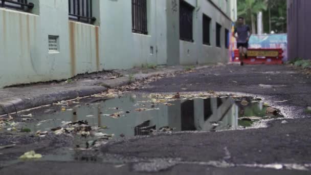 Running Puddle City Back Street — Stock Video