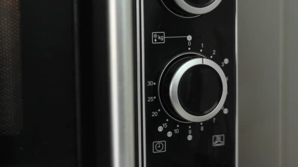 Timer Microwave Running Ending Close Angled Shot — Stock Video