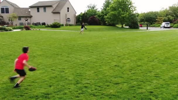 Footage Two Young Male Caucasian Brothers Playing Catch Running Together — Stock Video