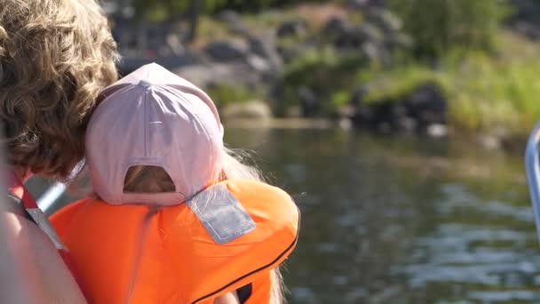 Young Little Girl Grandmother Sitting Boat Approaching Summer Cabin Dock — Stock Video