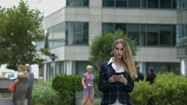 Beautiful Young Millennial Businesswoman Walks City Using Phone Slow Motion — Stock Video