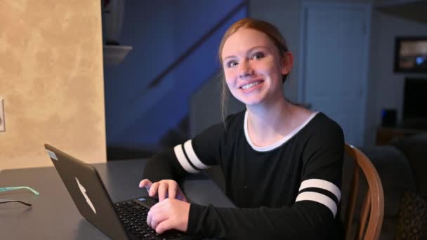 Young Girl Looks Her Computer Smiles Shakes Her Head Agreeing — Stock Video