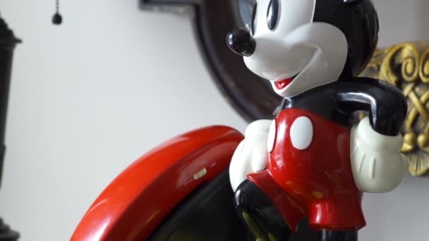Man Answers Mickey Mouse Phone Closeup — Stock Video
