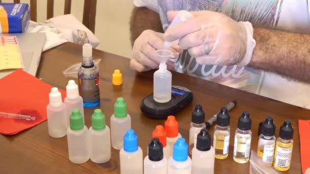 Medium Shot Man Mixing Different Flavors Create Eliquid Vaping Electric — Stock Video