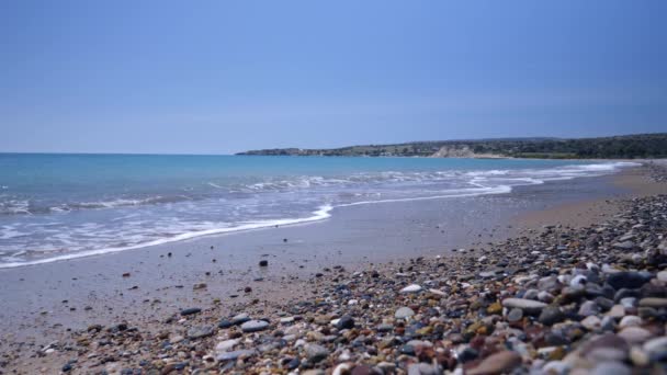 Wide Low Angle View Waves Cresting Rocky Beach Shore Cyprus — Stock Video