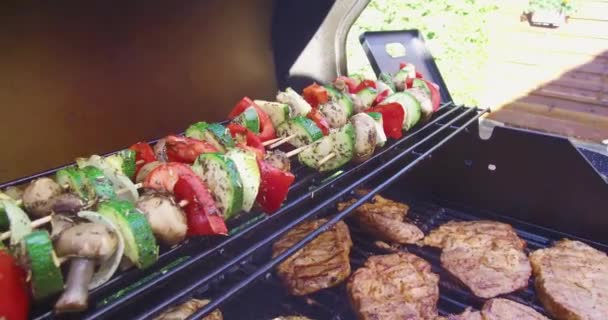 Classic BBQ in summer with meat and vegetables.