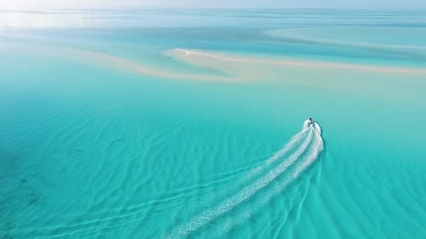 Boat Approaches Incredible White Sand Bank Bahamas Stock Footage