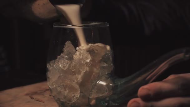 Brown Liquid Being Served Pipe Cocktail Glass Filled Ice — Stock Video