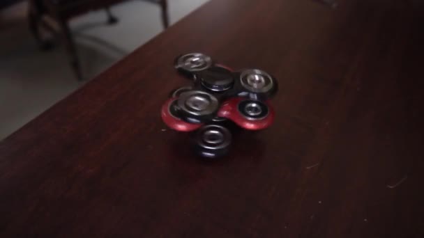 Overhead Close Three Fidget Spinners Spinning Top Each Other — Stock Video