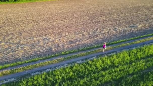 Man Woman Running Pathway Shot Aerial View Evening — Stock Video