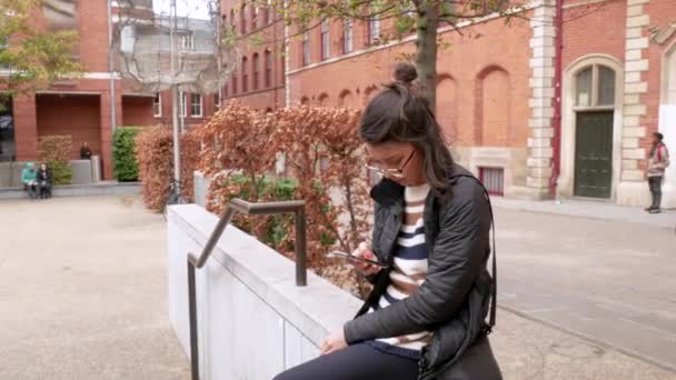 Handheld Shot Young Woman Staring Intently Her Phone — Stock Video