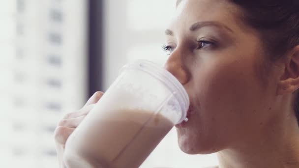 Close Happy Blue Eyed Brunette She Drinks Protein Shake Bright — Stock Video