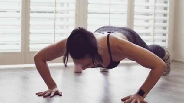 Brunette Woman Does Pushups Sports Bra Tights Bright Studio — Stock Video