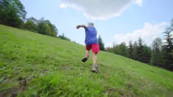 Child Running Free Mountain Meadow — Stock Video