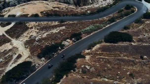 Group Quad Bikes Pan Revealing Dramatic Coastline Cliffs — стокове відео