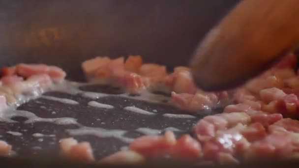 Close Pieces Greasy Bubbling Steaming Bacon Bits Hot Frying Pan — Stock Video