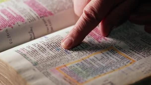 Man Reading Book Scrolling Index Finger — Stock Video