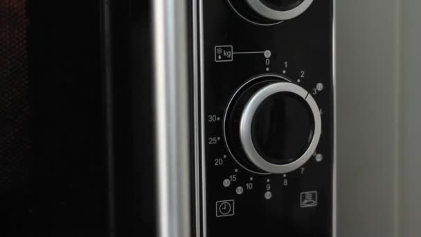 Setting Microwave Timer Two Minutes Turning Microwave Close Angled Shot — Stock Video