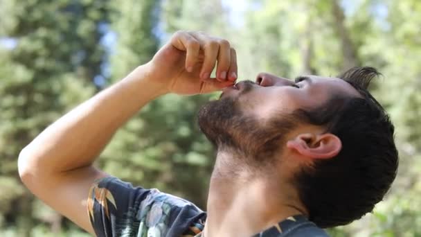 Slow Motion Shot Man Popping Cherry His Mouth Chewing — Stock Video