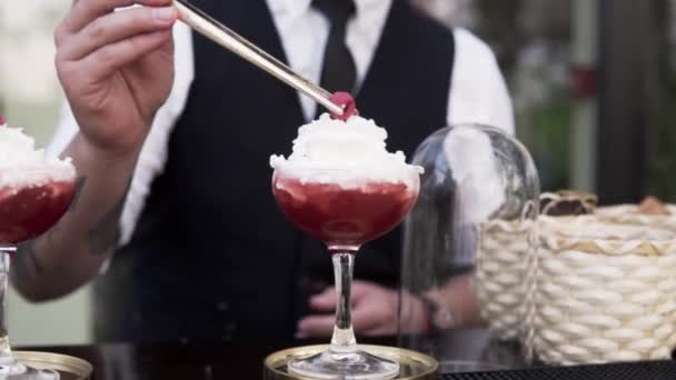 Bartender Hand Put Raspberry Pincers Top Red Cocktail Cream Slow — Stock Video