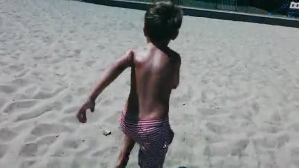 Pov Camera Chases Little Boy Sandy Beach Summer Day — Stock Video