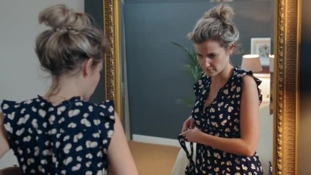 Young Caucasian Woman Looking Her Reflection Trying Out New Dress — Stock Video