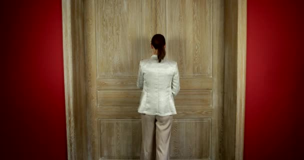 Woman Opening Double Wooden Door Walks Room Shot Static — Stock Video