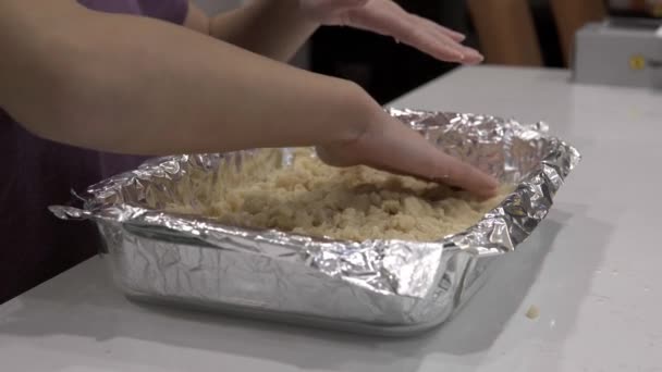 Young Girl Prepares Crust Baking Tray Making Millionaire Shortbread Cookies — Stock Video