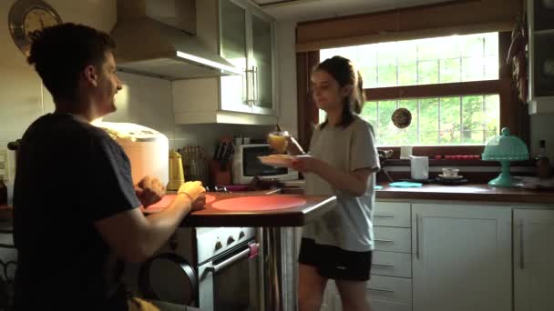 Young Girlfriend Prepares Breakfast Boyfriend Kitchen — Stock Video