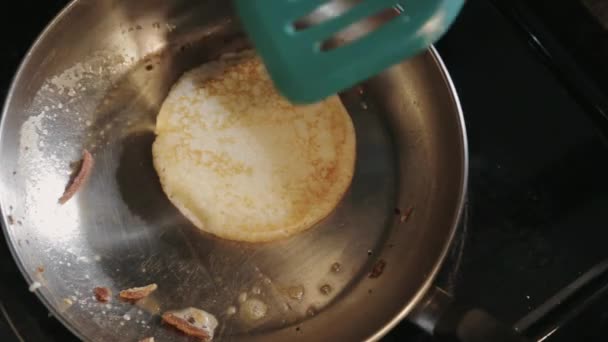 Turning Hot Pancake Stainless Pan Melted Butter Using Green Spatula — Stock Video