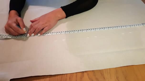 Close Female Tailor Hands Taking Measure Ruler White Fabric Prepararation — Stok Video