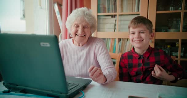 Grandmother Child Using Laptop Browsing Internet Having Fun — Stock Video