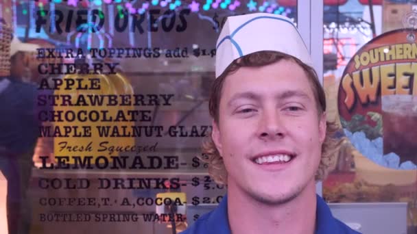 Fried Oreo Food Stand Concession Worker Young Man Standing Front — Stock Video