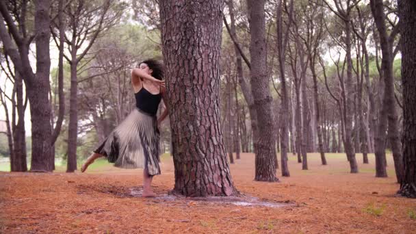 A Beautiful Woman Dancing Ballet On Barefoot With A Backdrop Of Trees In Australia. -medium shot