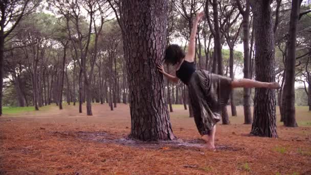 A Danseuse In Barefoot Doing A Grande Battement Followed By A Split Jet Inside The Centennial Park In  Sydney, Australia. -medium shot.