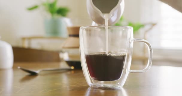 Close Young Woman Pouring Cream Her Coffee Stirring Taking Sip — Stock Video