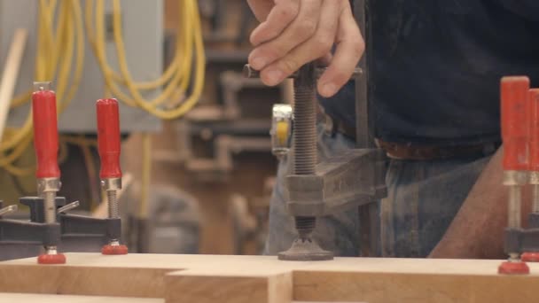 Carpenter Tightens Vice Holding Boards Wood Together Slow Motion — Stock Video