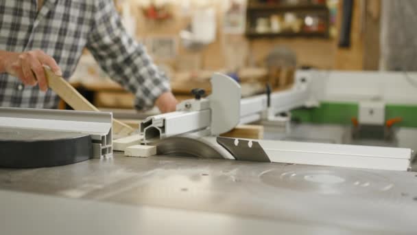 Carpenter Cuts Same Size Pieces Batten Circular Bench Saw Close — Stock Video