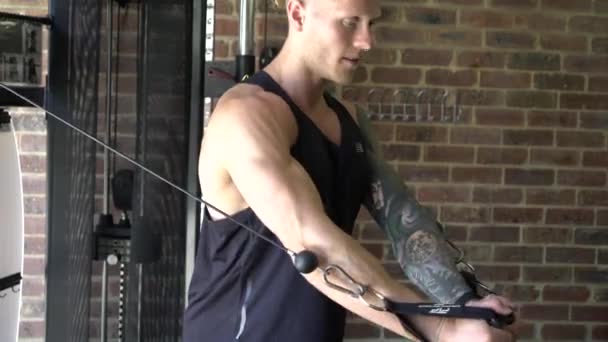 Tattooed Man Home Gym Shot Side Cable Chest Fly — Stock Video