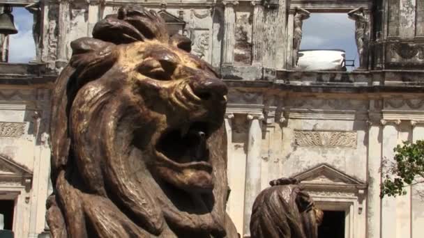 Lion statues at the facade of the Cathedral of the Assumption of Mary in Leon, Nicaragua.