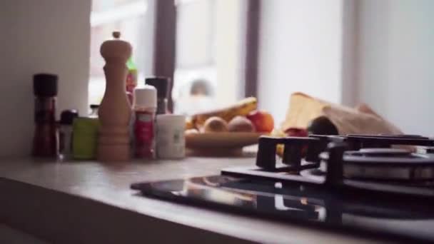 Close Kitchen Countertop Stove Vegetables Condiments Slider Shot — Stock Video