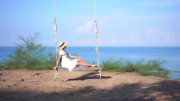 Unrecognizable Woman Sundress Hat Swinging Big Bench Swing Ropes Amazing — Stock Video