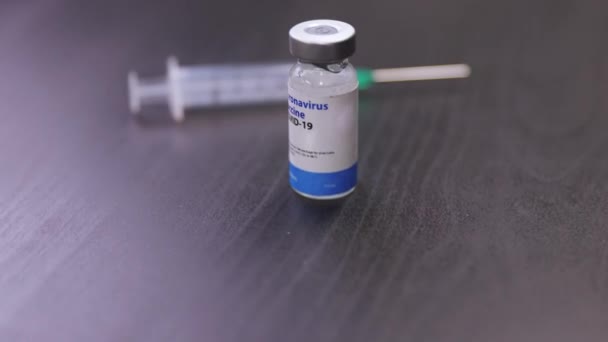 Close Sliding Shot Covid Coronavirus Vaccine Vial Syringe — Stock Video