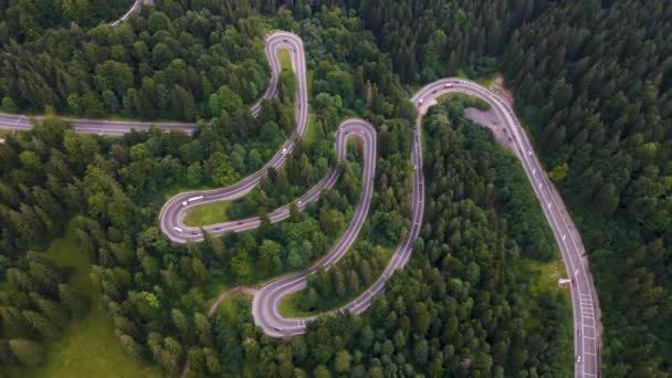 Overhead 4K drone clip  over a winding road on the mountainous area of Busteni,Transylvania, Romania