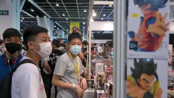 Návštěvníci nakupují zboží během výstavy Anicom a her ACGHK na kongresovém a výstavním centru v Hongkongu