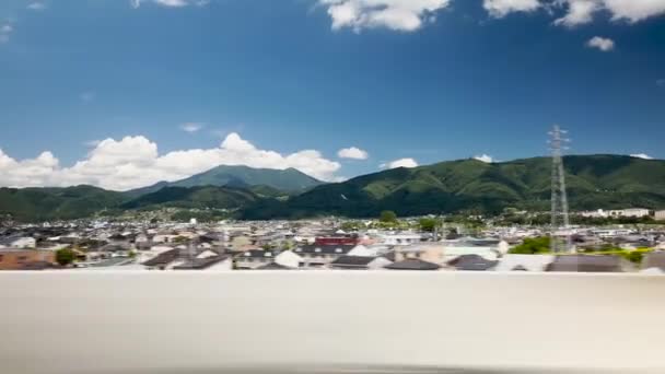 Utsikt Över Japanska Förorter Från Ett Kultåg Shinkansen Fönster Delvis — Stockvideo
