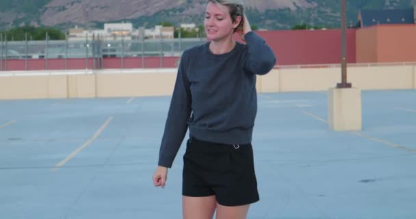 Caucasian White Girl Empty Parking Lot Throwing Hands Punching Air — Stock Video
