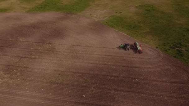 Aerial Shot Tractor Plowing Farm Field Brown Soil Agricultural Area — Stock Video