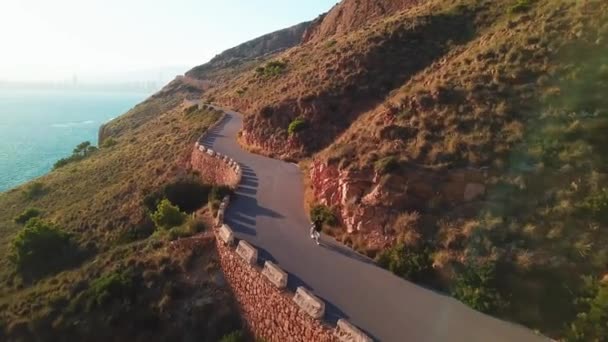 Aerial View Young Fit Male Athlete Riding Cycle Empty Path — Stock video